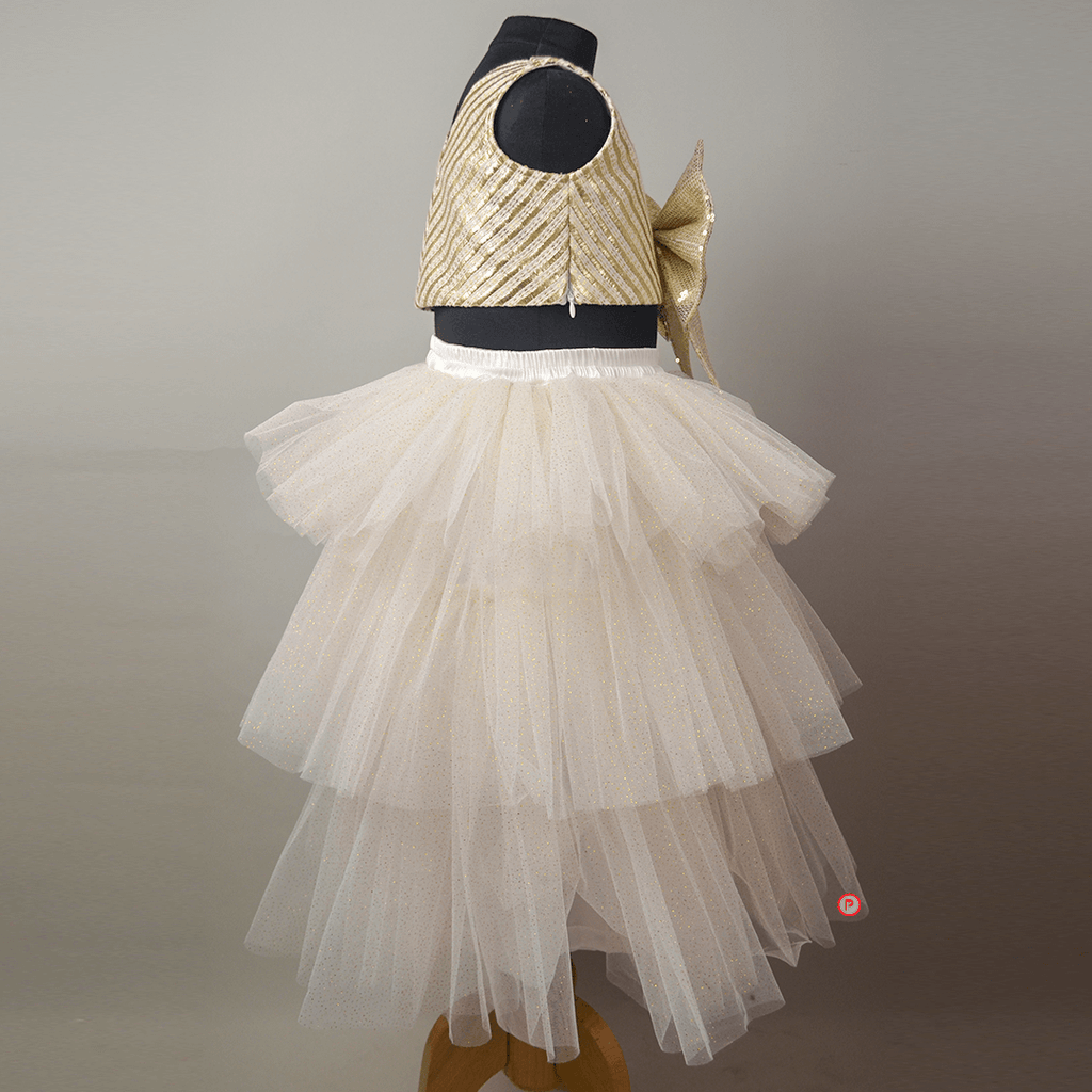 White And Golden Lehenga With Big Bow