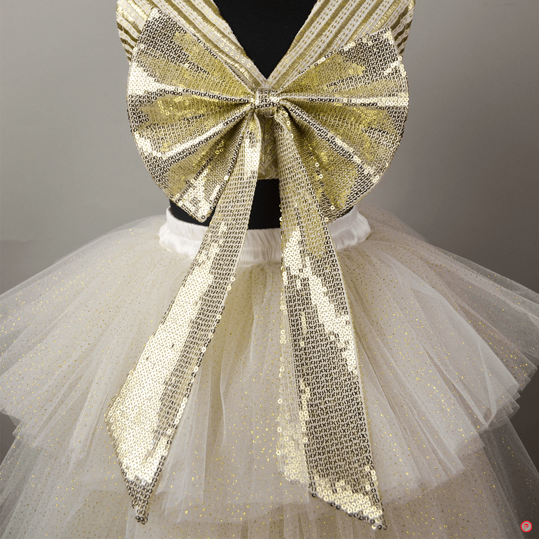 White And Golden Lehenga With Big Bow