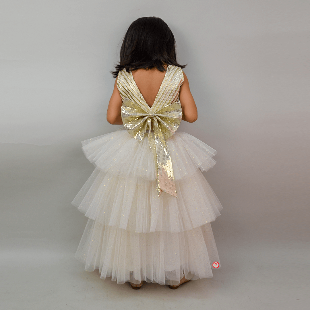 White And Golden Lehenga With Big Bow